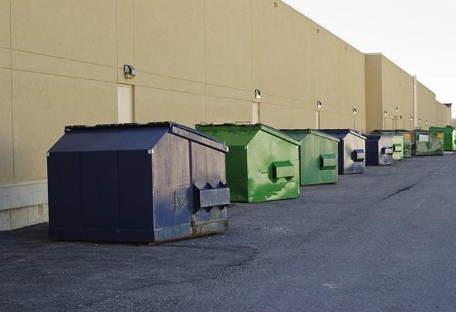 large construction waste containers in a row at a job site in Hubbard